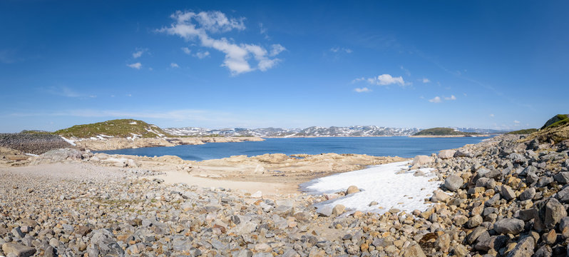 Big panorama of montain lake at Suleskard mountain pass touristic road Norway