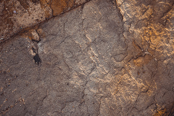 Close up shot of the rough sandstone rock on the coast at Yamba, New South Wales.