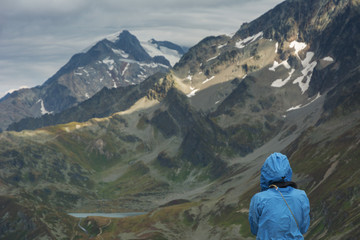 Hiking trails in the French Alps with stunning views of rocky mountains and alpine meadows.