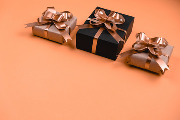 Christmas holiday composition. Various gift boxes on pastel orange background. Christmas, new year, birthday concept. Flat lay, top view, copy space