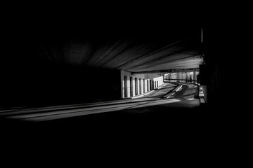 Black and white parking hall with shadows
