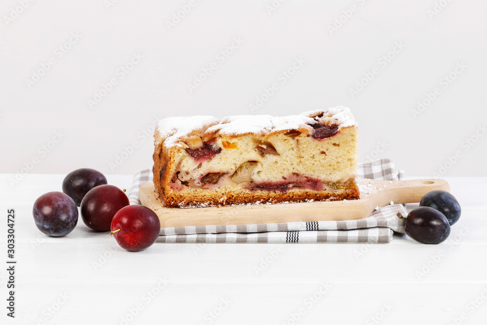 Poster piece of homemade plum cake.