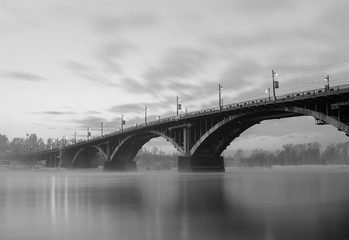 Fototapeta na wymiar The bridge over the Angara River located in the city of Irkutsk