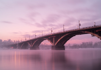 Fototapeta na wymiar The bridge over the Angara River located in the city of Irkutsk