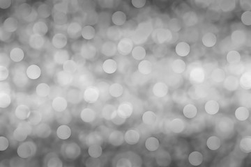 Silver bokeh lights abstract background