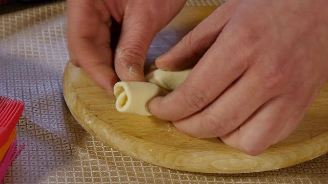 the process of cooking khachapuri in the kitchen