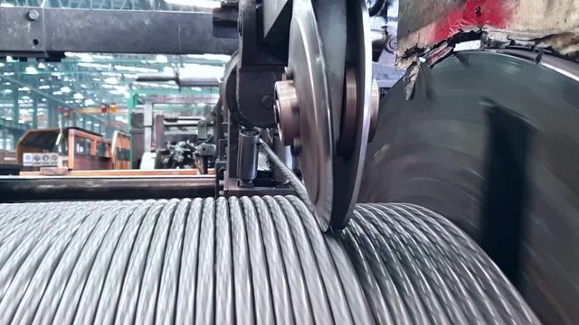Coiling machine, Coiling the strand wire to round shape, Industrial production of steel wire production