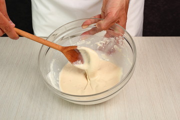 Preparing Poolish, mixing ingredients. Making Yeast Sweet Roll Bun