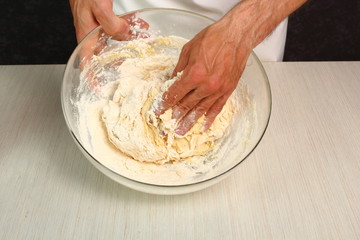 Fototapeta premium Preparing Dough, mixing ingredients. Making Yeast Sweet Roll Bun