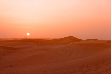 Fototapeta na wymiar Sand desert sunset landscape view, picturesque landscape with sun, UAE.