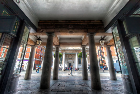Street Photography of Symmetrical Corridor and Columns in Covent Garden, London, UK