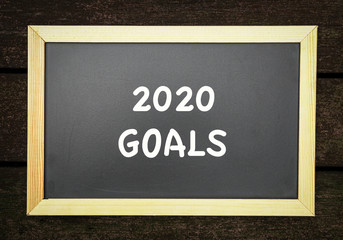 Fototapeta premium 2020 new year goal, plan, action text on black board.
