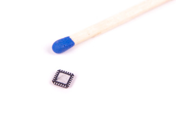 QFN case electronics component in comparison with match head