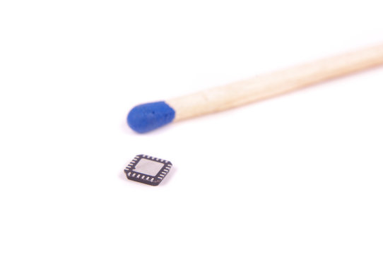 QFN case electronics component in comparison with match head