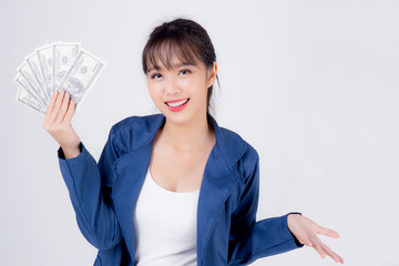 Beautiful portrait young business asian woman holding money isolated on white background, businesswoman showing banknotes with excited, happy girl income with profit finance and success concept.