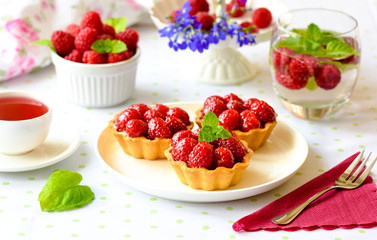 Homemade tartlets with raspberries fruits