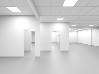 An empty office with white walls and blank doors