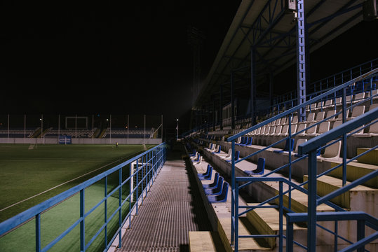 Empty Stands At The Football Stadium At Night