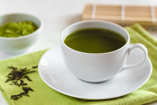 Green tea matcha in a white cup