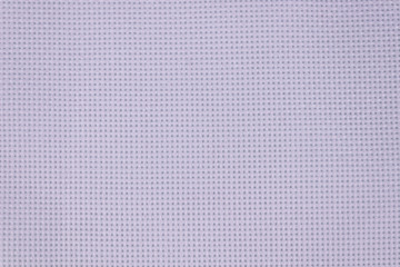 dense fabric, canvas, in the hole, white for needlework, highlighted in closeup on a white background.