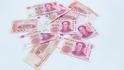 Chinese paper currency Yuan renminbi bill banknotes on white background, Banknote one hundred yuan,...