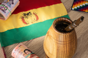 Bolivia.  Country flag on the background of the old map and things associated with Bolivia