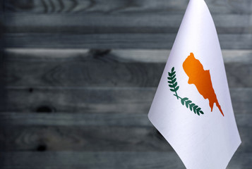 Fragment of the flag of the Republic of Cyprus in the foreground blurred background copy space