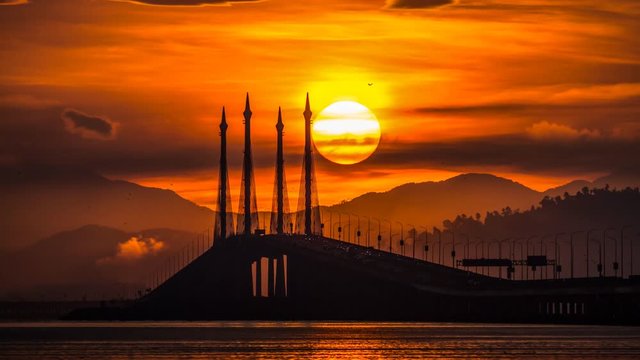 4K Time Lapse view of sunrise from Penang Bridge of George Town