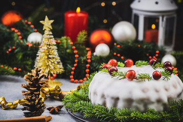 Fototapeta na wymiar Christmas Fruit Cake on Festive Dinner Table