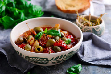 caponata siciliana in ceramic bowl