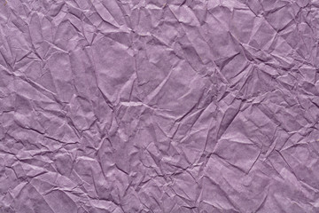 Crumpled paper background in beautiful violet color for your greeting card.