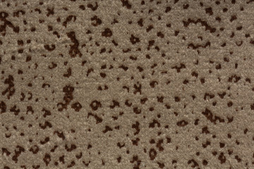 Grey textile background with contrast surface.