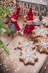 Fototapeta na wymiar christmas gingerbread cookies on wooden background