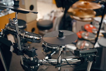 Fototapeta na wymiar Digital drum set in music store, nobody