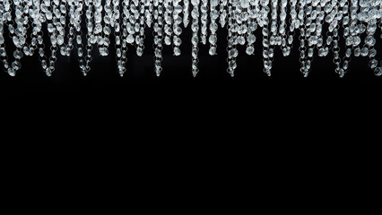Chandelier with glass beads on a black background, close-up