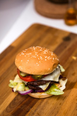 Hamburger on the wooden table