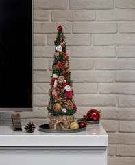 Christmas decoration. Handmade Christmas tree in the interior of the house. preparation for the celebration