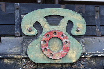 An old wooden telephonesign in Osaka-Japan.