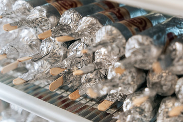 Ice cream Popsicles in foil at gelato shop