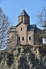 Fototapeta na wymiar Metekhi Church of the Assumption Portrait, Low-Angle View, Tbilisi, Georgia