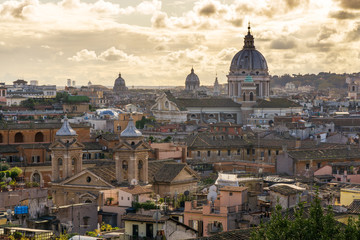 Fototapeta na wymiar panorama of Rome with the dome of San Carlo al Corso in the backgroundf rom the public park Pincian Hill, Villa Borghese gardens, Rome, Italy