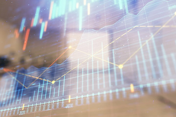 Stock market chart with trading desk bank office interior on background. Double exposure. Concept of financial analysis