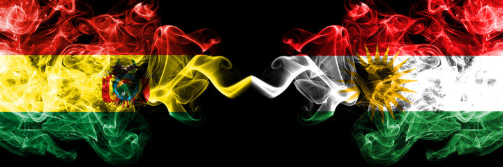 Bolivia, Bolivian vs Kurdistan, Kurdish smoky mystic states flags placed side by side. Concept and idea thick colored silky abstract smoke flags