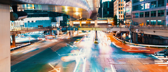 View of motion blurred traffic in Shibuya, Tokyo, Japan at night