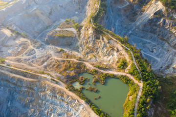 Aerial view of the large mine that exploded the mountains for the mining and construction industry..