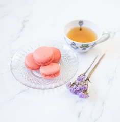 hot tea set with macaroons and dried flowers Vintage style