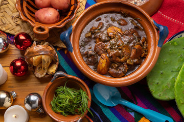 Mexican rosemary with mole sauce and dried shrimps also called 
