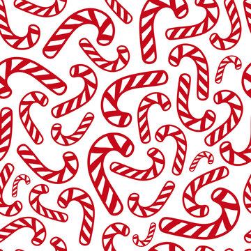 christmas seamless pattern with hand drawn candy cane on white background