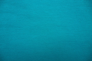 Closeup of beautiful quality cotton mixed with polyester fabric in blue and turquoise tone for textile texture and background. Cool banner on page and cover