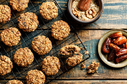 Healthy dessert. Homemade oatmeal cookies with dates and nuts, do not contain sugar, butter and eggs. - Powered by Adobe